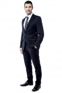 Handsome entrepreneur posing over white